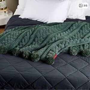 Green Textured Throw Blanket with Pom Poms.